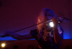 Ute Passionflower performing on her light emitting 5 string violin at the supperclub Amsterdam, tonight, 9.30pm